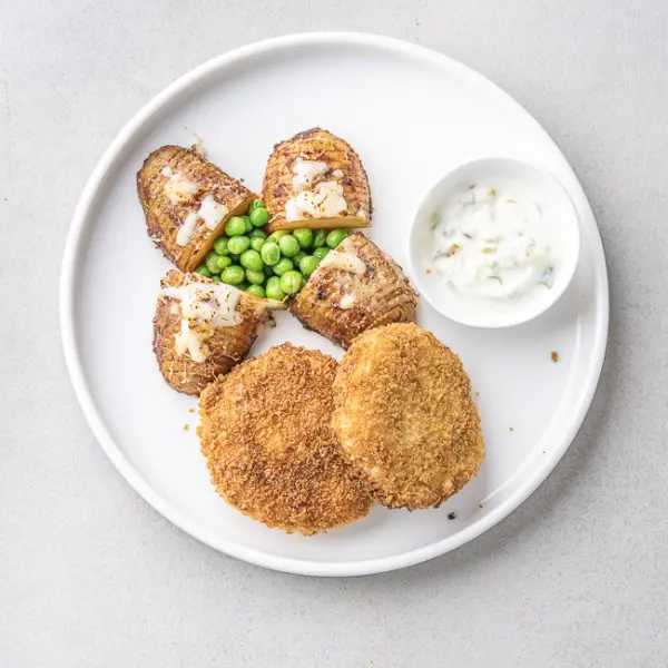 British Fishcakes with Hasselback Potatoes, Peas & Tartar Sauce